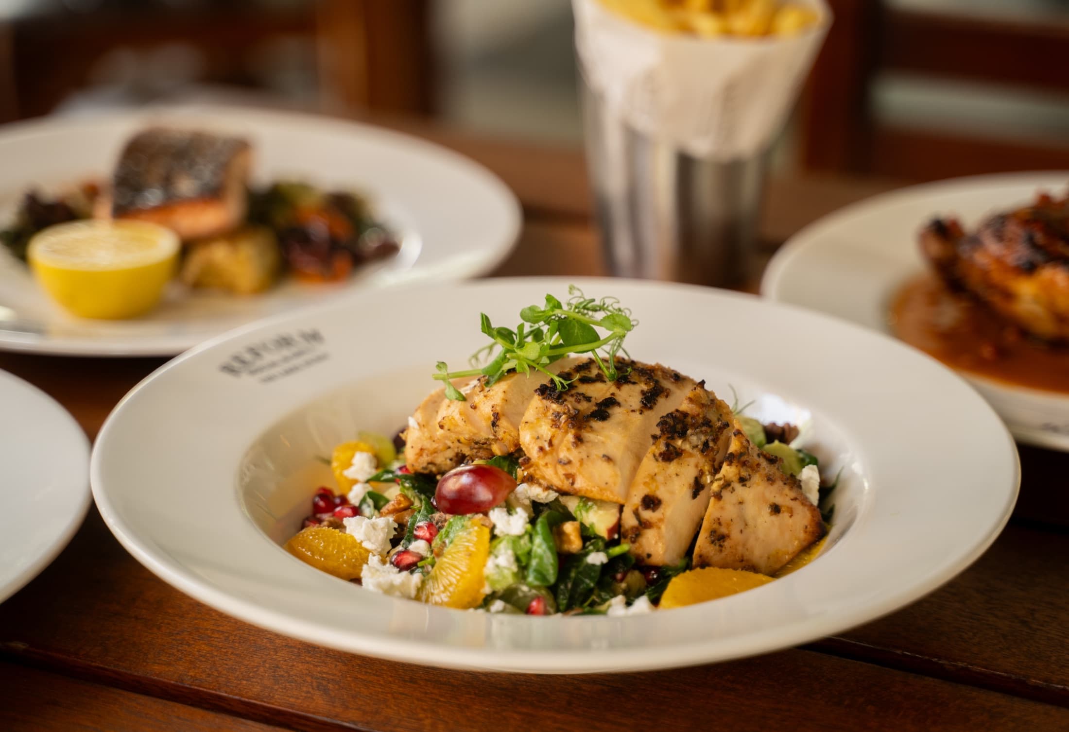Grilled chicken salad with citrus, feta and pomegranate at Reform Social & Grill